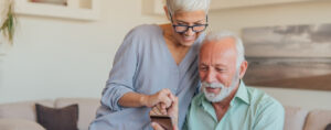 senior couple life insurance quotes on phone